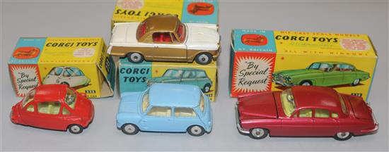 A Corgi Toys Jaguar Mark X No. 238 (cerise) and three other boxed Corgi cars,